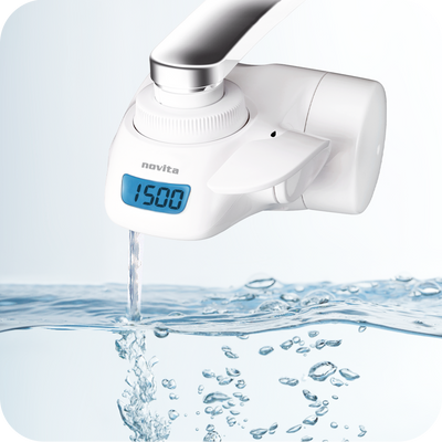 A novita water faucet with water coming out of it.