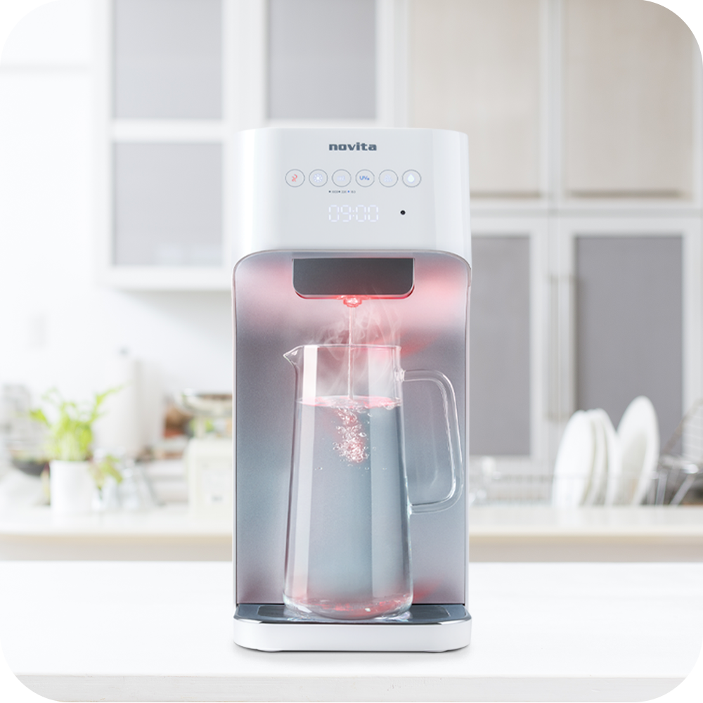 A novita Hot/Cold Water Dispenser W28 – The WaterStation in a kitchen.