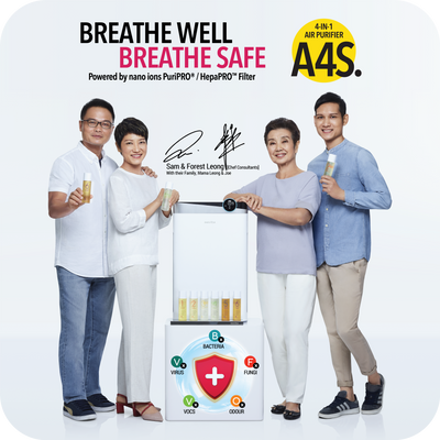 A group of people posing for a photo with the 4-In-1 Air Purifier A4S by novita, with the words breathe well breathe safe.