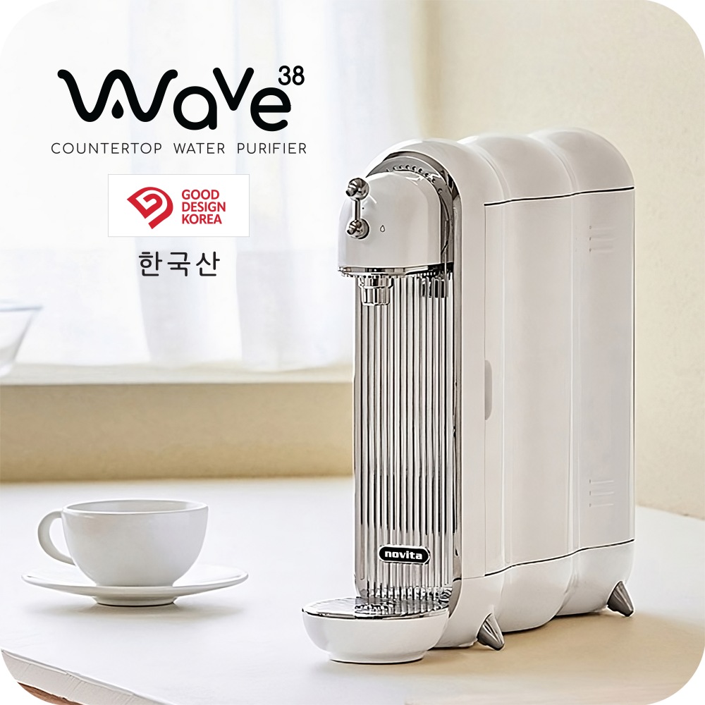 A novita Water Purifier W38 with a cup of coffee next to it.