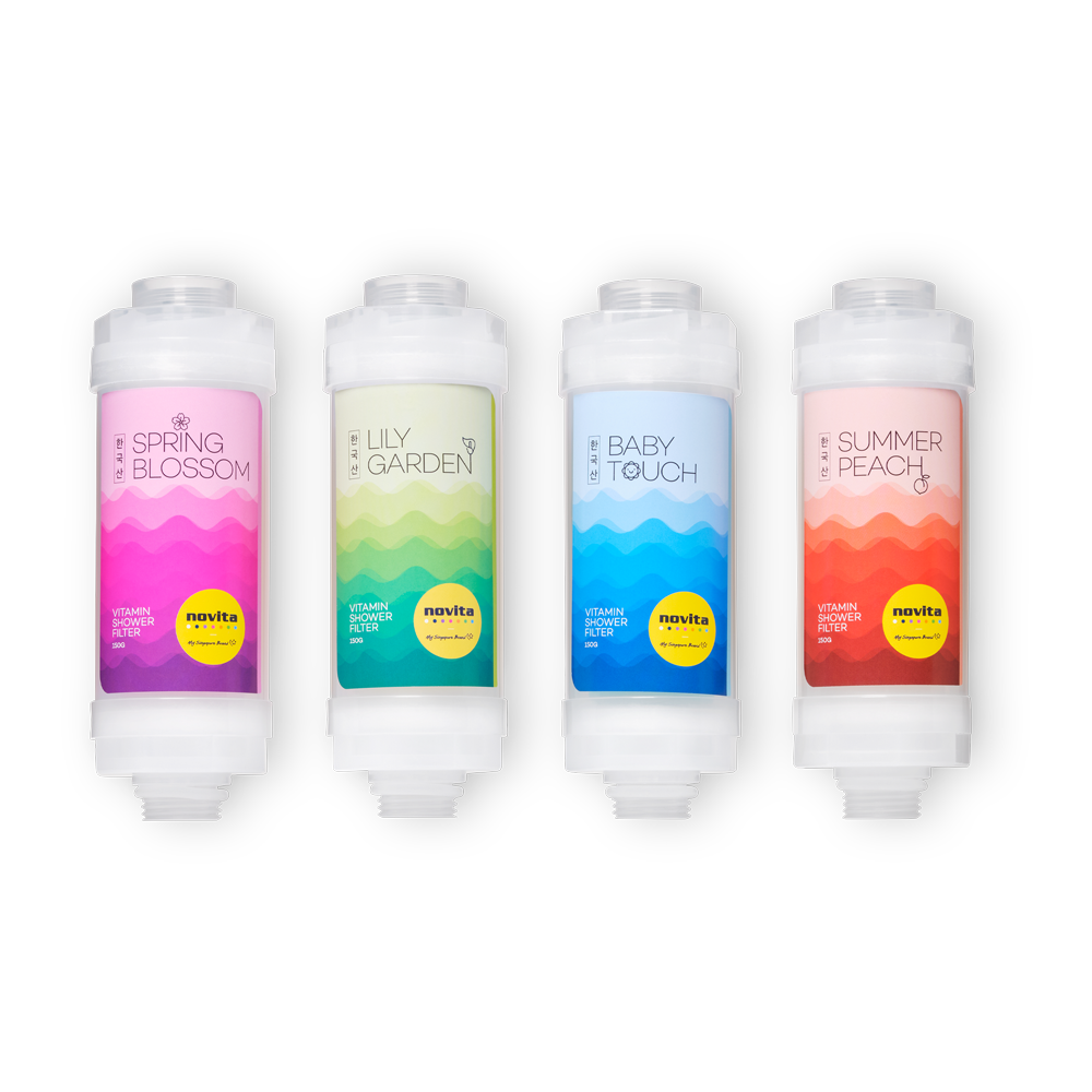 A set of four novita SG Vitamin Shower Filters with different colors.