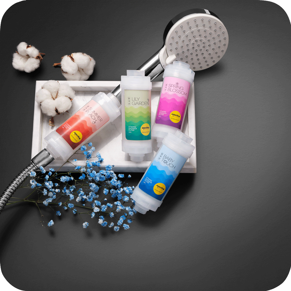 A tray with a Vitamin Shower Filter, soap, and cotton by novita SG.