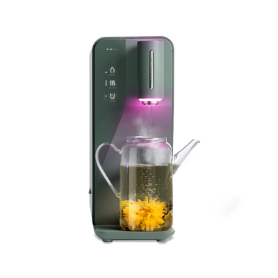 A novita Instant Hot Water Dispenser W10 with a cup of tea in it.