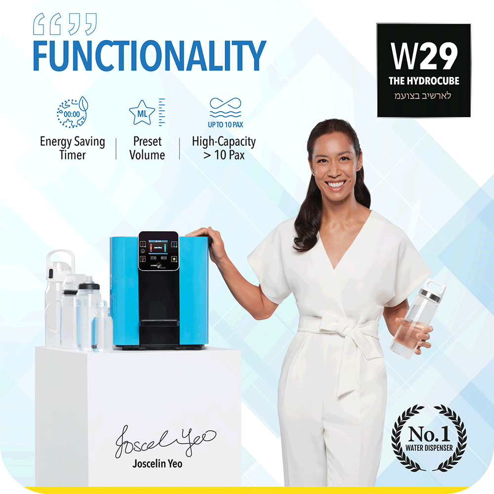 A woman is standing next to a novita HydroCube™ Hot/Cold Water Dispenser W29 with 3 Years Warranty.