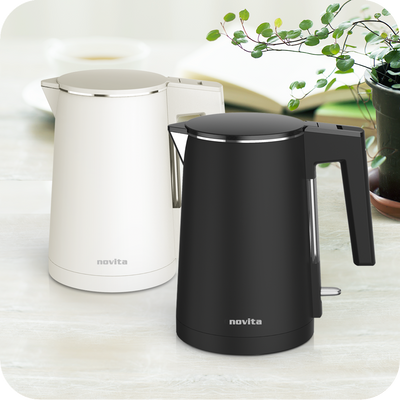 A black and white novita kettle sitting on a table.