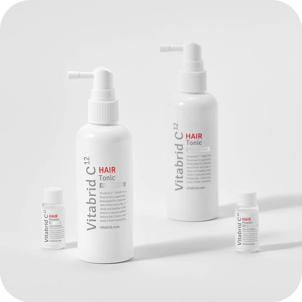 Three bottles of Restore & Regrowth Set: Vitabrid C¹² Scalp⁺ Shampoo + Vitabrid C¹² HAIR Tonic Set: Professional on a white background.