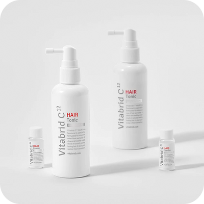 Three bottles of Restore & Regrowth Set: Vitabrid C¹² Scalp⁺ Shampoo + Vitabrid C¹² HAIR Tonic Set: Professional on a white background.