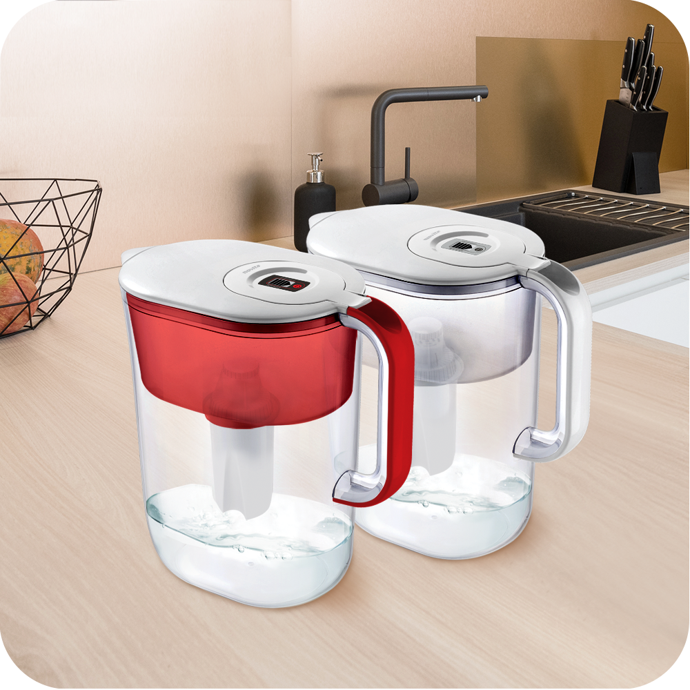 Two novita HydroPlus®/HydroPure™ Water Pitcher NP120s sitting on a kitchen counter.