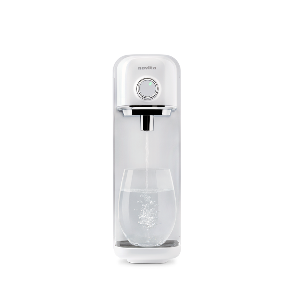 A novita Instant Hot Water Dispenser W18 with a glass of water.