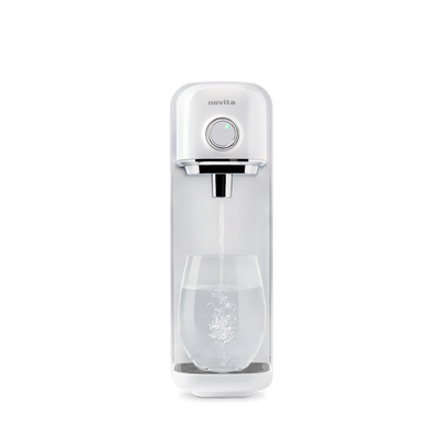 A novita Instant Hot Water Dispenser W18 with a glass of water.