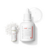 A bottle of Revive & Reignite Set: Vitabrid C¹² Scalp⁺ Shampoo + Vitabrid C¹² 12H Vitamin C Hair⁺ Set and a bottle of white powder.