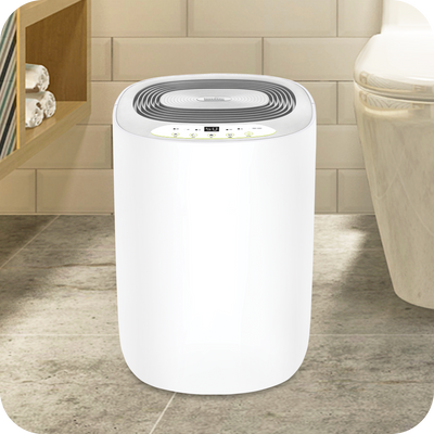 A white novita Dehumidifier ND298 in a bathroom that effectively removes impurities and odors.