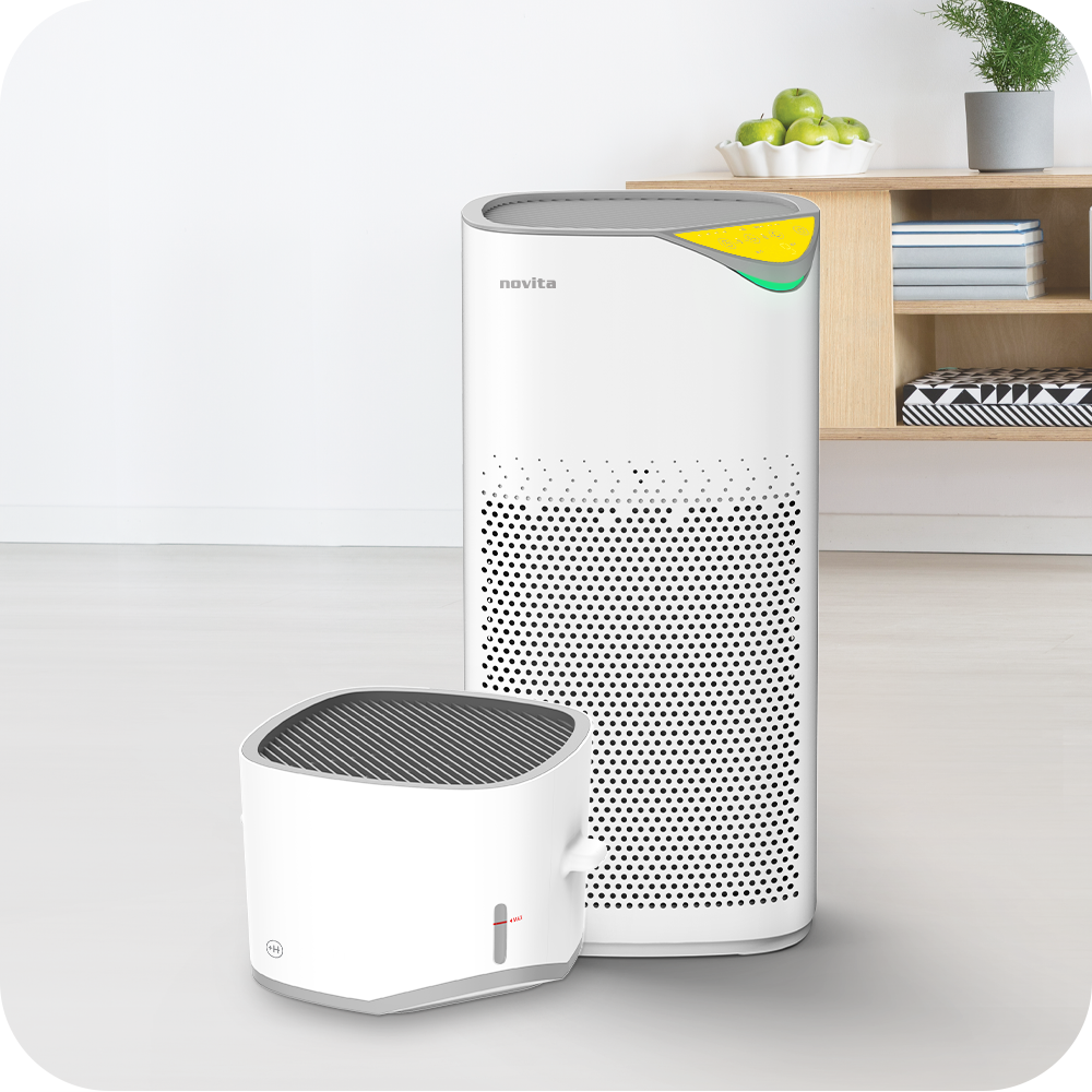 A white novita Air Purifier + Humidifier A2+H and a small white box in a living room.