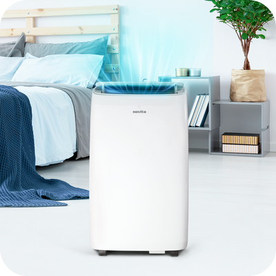 A white novita Coolplus™ 3-In-1 Portable Air Conditioner NAC12000UV in a bedroom.