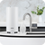 Product Description: A white kitchen sink with a novita HydroPlus® Premium Undersink Water Ionizer NP12000 built-in water dispenser.