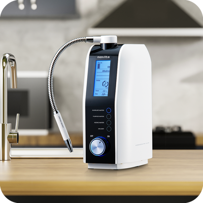 A novita HydroPlus® Premium Water Ionizer NP9960i sitting on top of a kitchen counter.