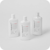 Three bottles of Vitabrid C¹² Scalp+ Shampoo on a white background.